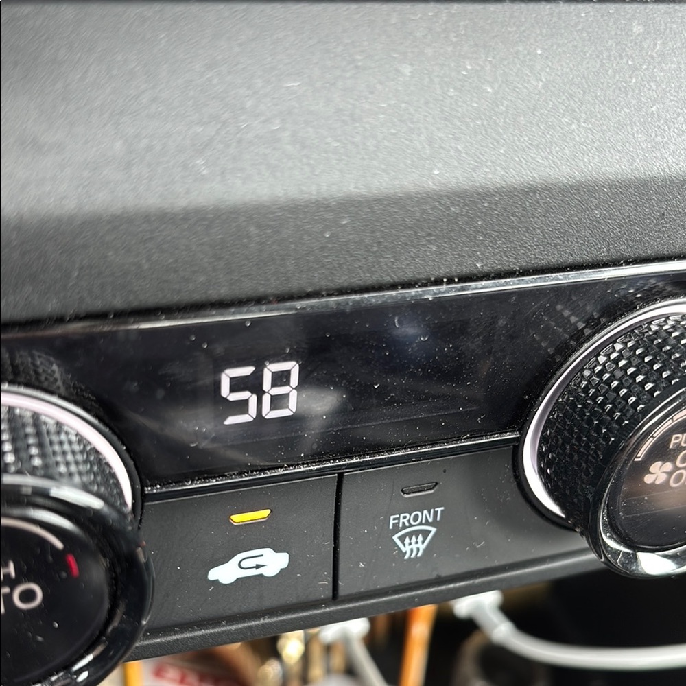 Black Car Climate Control Panel